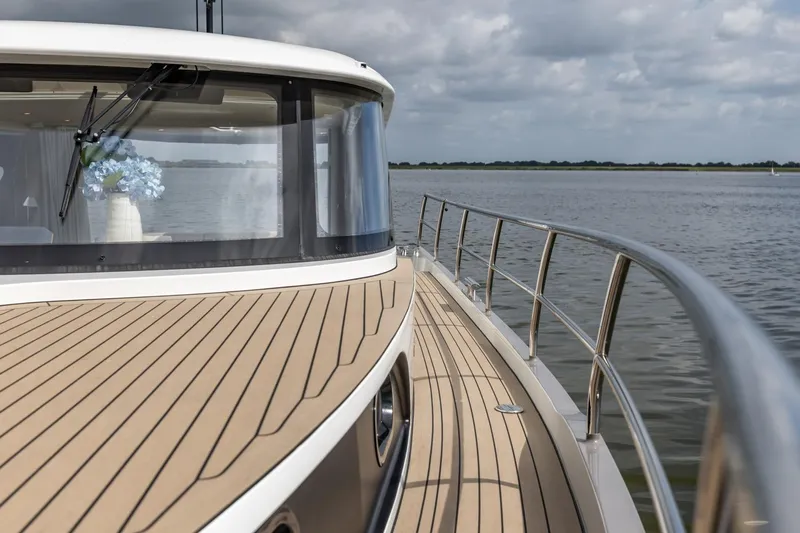  Yacht Photos Pics 2024 Vripack 42 Open Kuip yacht with stabilizers, featuring sleek deck design on calm waters.