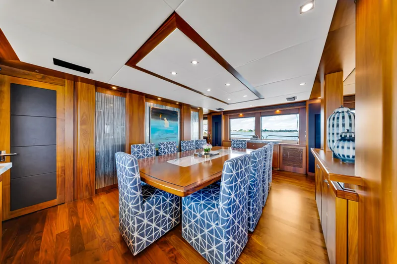 Natural 9 Yacht Photos Pics Luxurious dining area on a 2009 Sunseeker 37 Metre Yacht with elegant wood finishes.