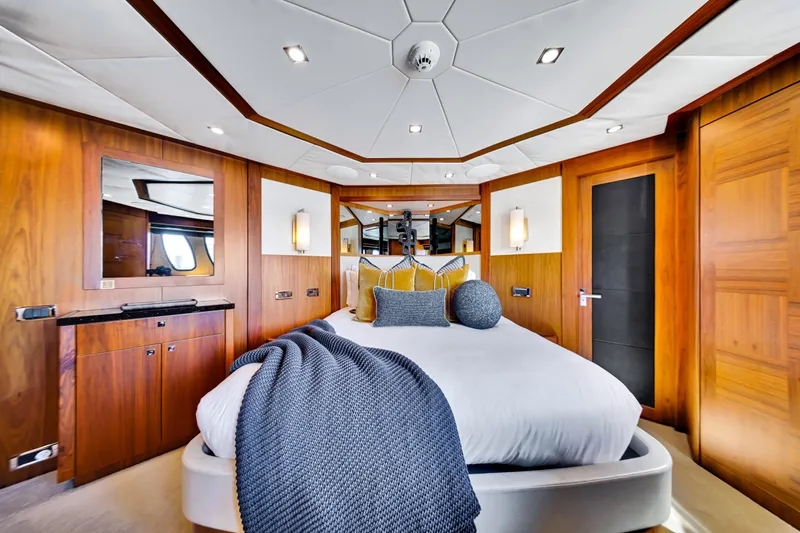 Natural 9 Yacht Photos Pics Luxurious bedroom interior on 2009 Sunseeker 37 Metre Yacht with elegant wood paneling.