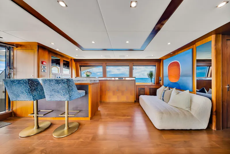 Natural 9 Yacht Photos Pics Luxurious interior of 2009 Sunseeker 37 Metre Yacht with modern seating and ocean view.