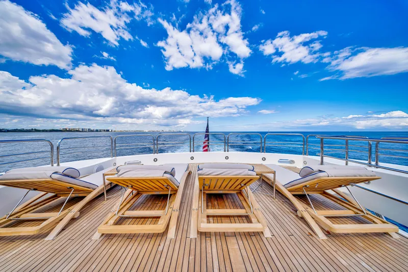 Natural 9 Yacht Photos Pics Sunseeker 37 Metre Yacht 2009 deck with sun loungers and ocean view.