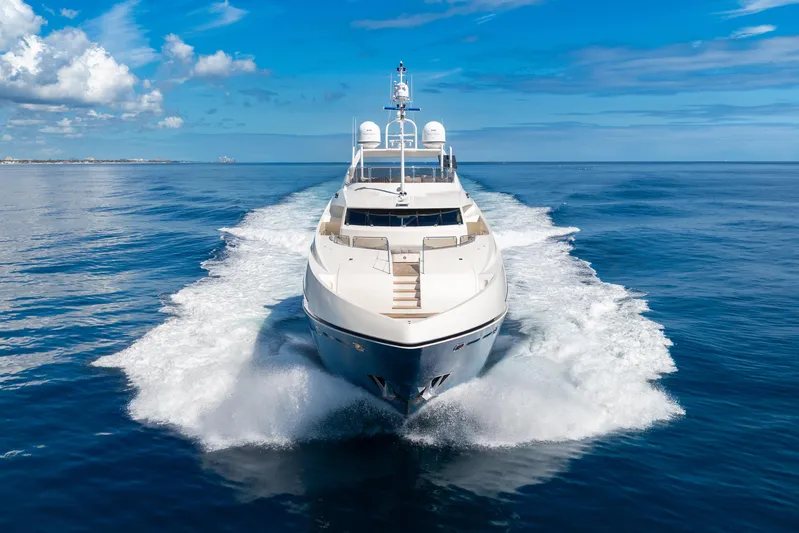 Natural 9 Yacht Photos Pics Luxurious 2009 Sunseeker 37 Metre Yacht cruising on open blue sea.
