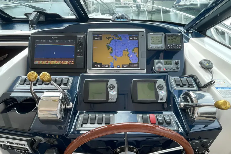 Sasea Yacht Photos Pics Dashboard of a 2009 Tiara Yachts 4200 Open with navigation and control systems.