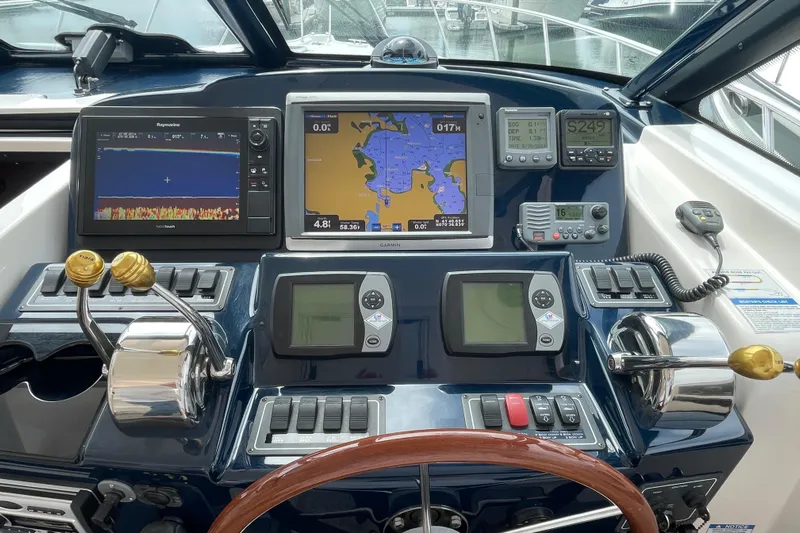 Sasea Yacht Photos Pics Dashboard of a 2009 Tiara Yachts 4200 Open with navigation and control systems.