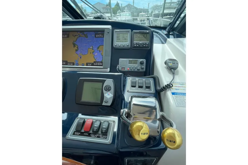Sasea Yacht Photos Pics 2009 Tiara Yachts 4200 Open helm with navigation equipment and controls.
