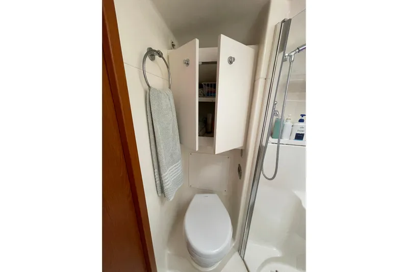 Sasea Yacht Photos Pics Bathroom interior of 2009 Tiara Yachts 4200 Open with shower and storage cabinets.