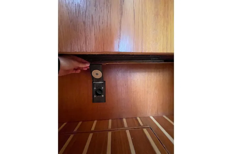 Sasea Yacht Photos Pics Hand adjusting mechanism inside 2009 Tiara Yachts 4200 Open wooden interior.