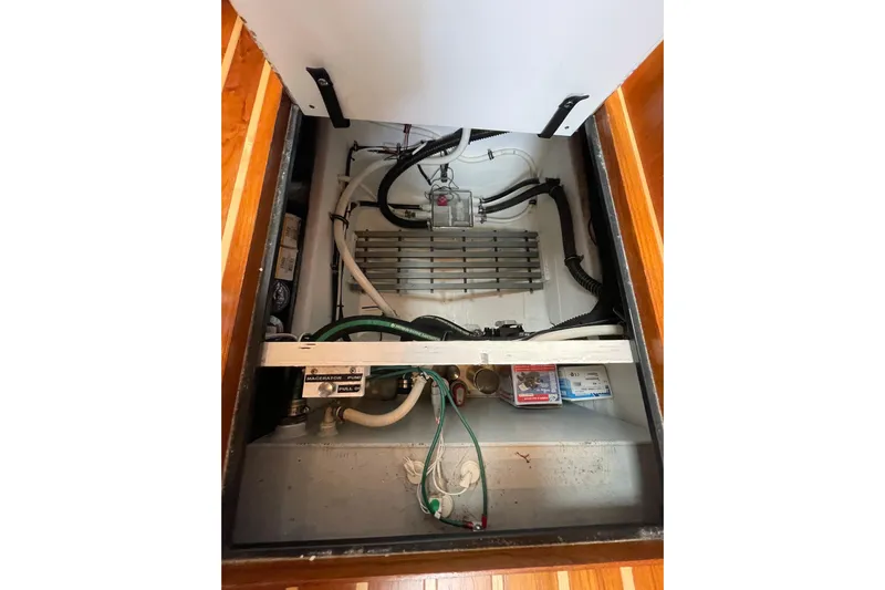 Sasea Yacht Photos Pics 2009 Tiara Yachts 4200 Open engine compartment with visible wiring and components.