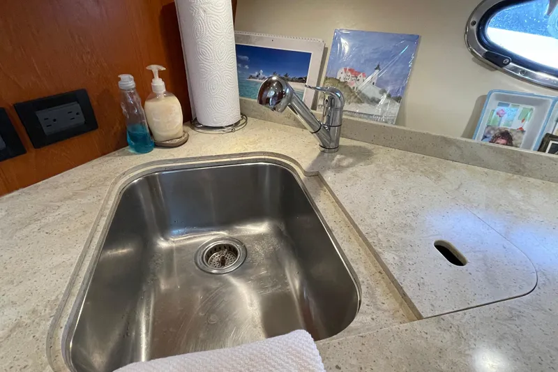 Sasea Yacht Photos Pics 2009 Tiara Yachts 4200 Open kitchen sink with countertop and faucet.