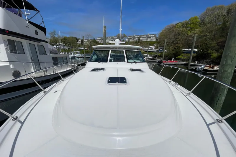 Sasea Yacht Photos Pics 2009 Tiara Yachts 4200 Open docked at marina, showcasing sleek design and spacious deck.