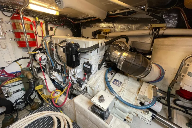 Sasea Yacht Photos Pics Engine room of 2009 Tiara Yachts 4200 Open, showcasing detailed mechanical components.