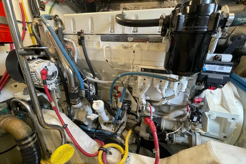 Sasea Yacht Photos Pics Engine compartment of a 2009 Tiara Yachts 4200 Open, showcasing detailed mechanical components.