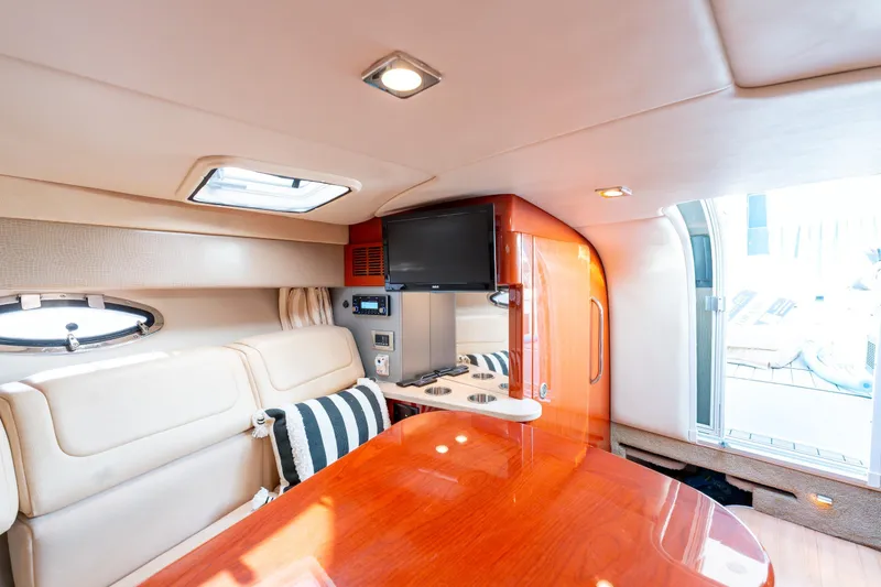  Yacht Photos Pics Luxurious interior of 2013 Formula 310 Sun Sport boat with seating and entertainment system.