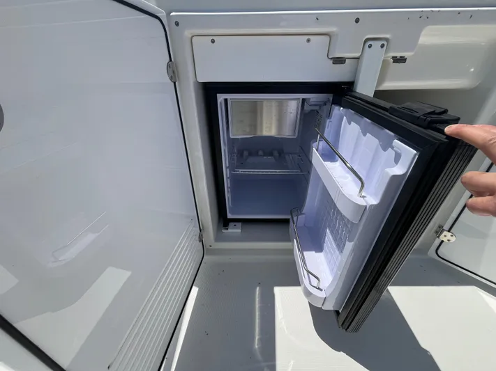  Yacht Photos Pics Open mini fridge on 2023 Beneteau Swift Trawler 41 Fly yacht.