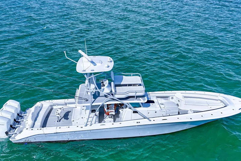  Yacht Photos Pics 2023 HCB 53 Sue&ntilde;os boat on clear blue water, aerial view.