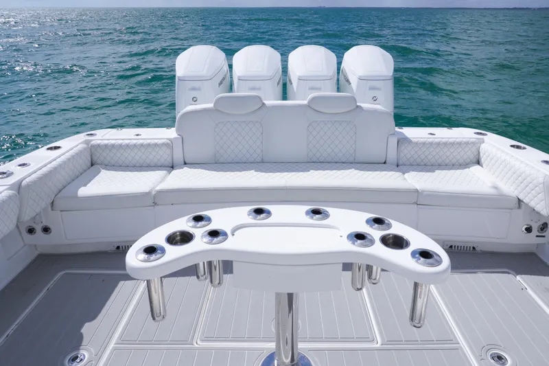  Yacht Photos Pics 2023 HCB 53 Sue&ntilde;os luxury boat interior with seating and ocean view.