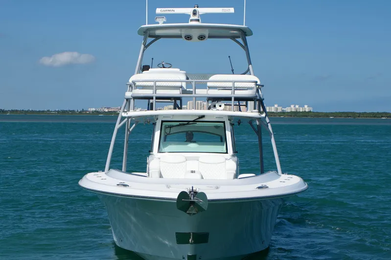  Yacht Photos Pics 2024 HCB 53 Sueños boat on blue water with clear sky background.