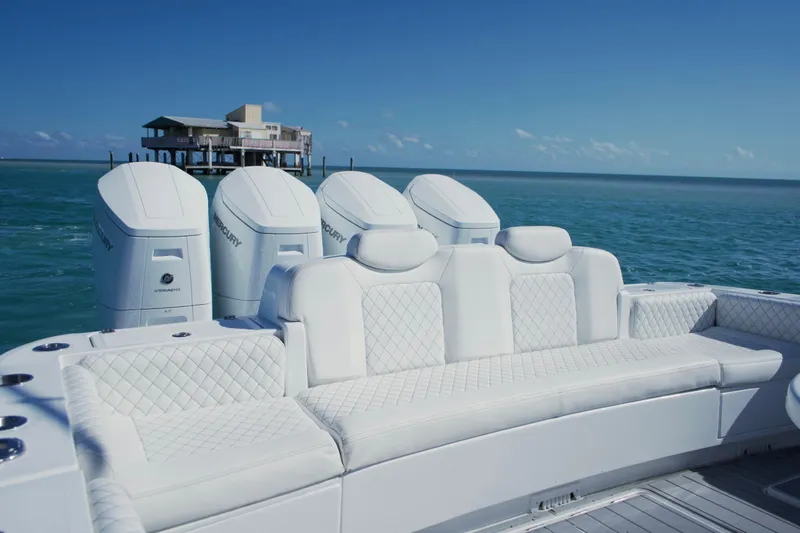  Yacht Photos Pics 2024 HCB 53 Sueños luxury boat with Mercury engines on open water.