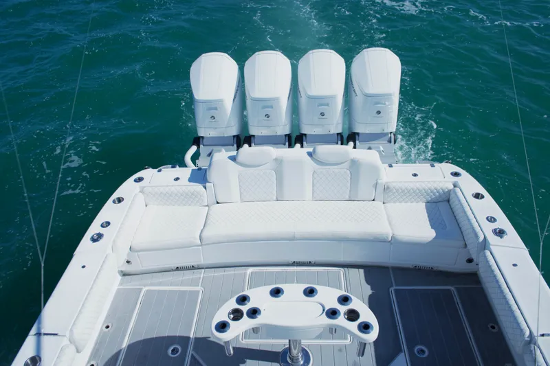  Yacht Photos Pics 2024 HCB 53 Sueños boat with four engines and luxurious seating on open water.