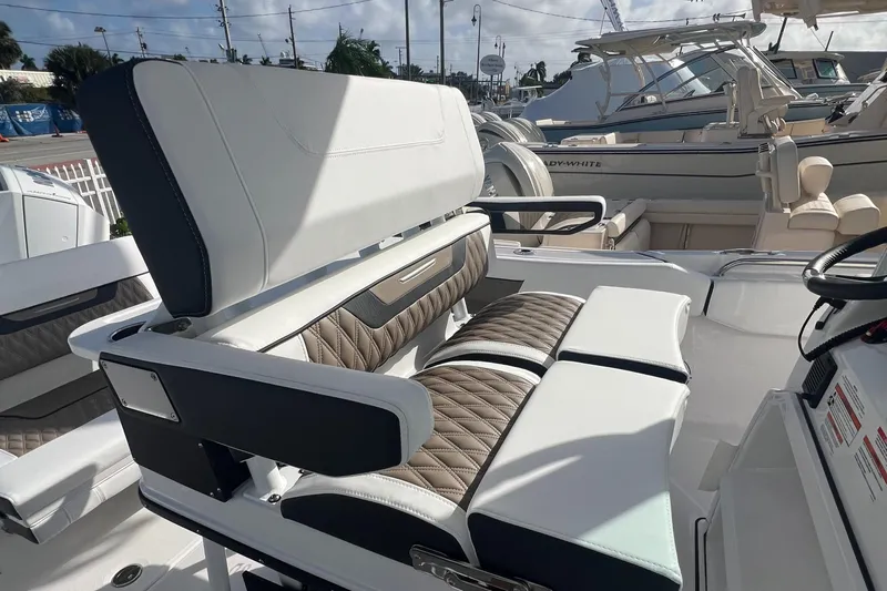 252-449 Yacht Photos Pics 2025 Blackfin 252 CC boat seating with luxurious upholstery and modern design.
