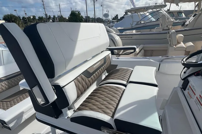 252-449 Yacht Photos Pics 2025 Blackfin 252 CC boat interior with luxurious seating and modern design.