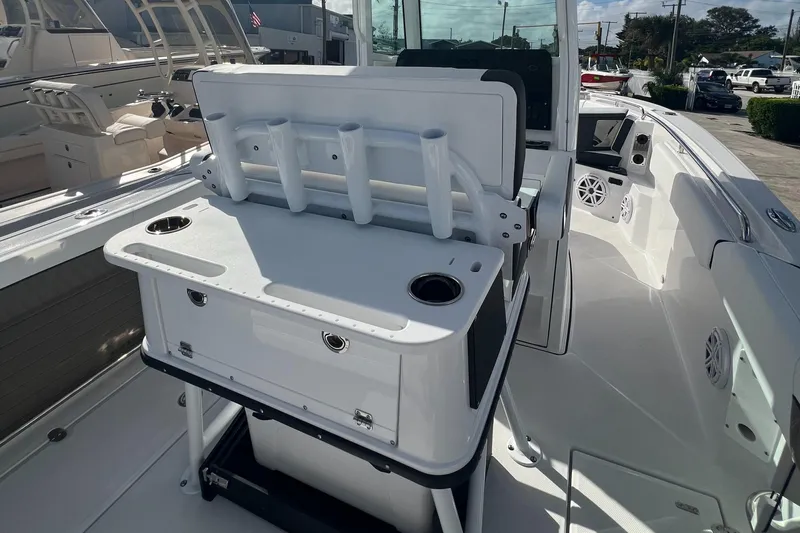 252-449 Yacht Photos Pics 2025 Blackfin 252 CC boat interior with fishing rod holders and storage.