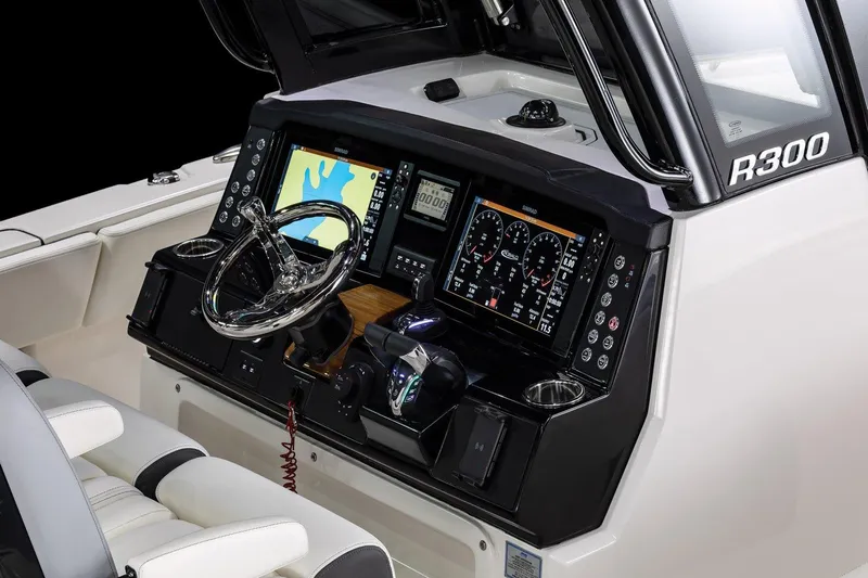  Yacht Photos Pics Manufacturer Provided Image: 2025 Robalo R300 Center Console dashboard with advanced navigation and control systems.