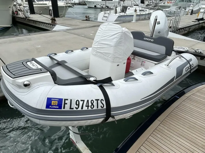 Alacrity Yacht Photos Pics Inflatable boat docked at marina, featuring Florida registration FL9748TS.