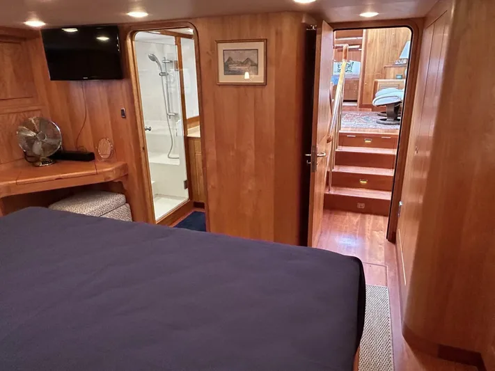 Alacrity Yacht Photos Pics Luxurious interior of 2008 Lyman-Morse Flybridge 62' yacht with wood paneling and modern amenities.