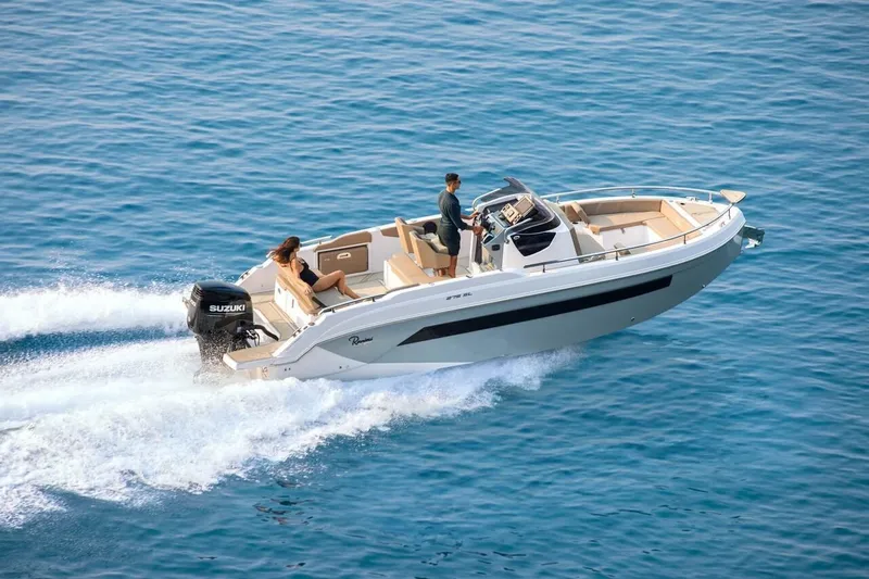  Yacht Photos Pics 2025 Ranieri 275 LS motorboat cruising on open blue water.
