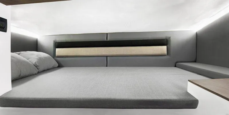  Yacht Photos Pics 2025 Ranieri 275 LS interior cabin with modern bedding and sleek design.