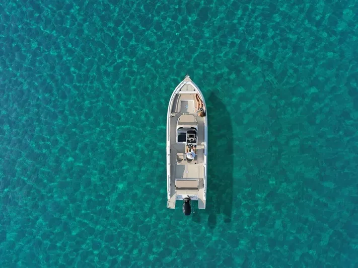  Yacht Photos Pics Aerial view of 2025 Ranieri 275 LS boat on clear turquoise water.
