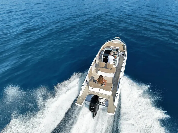  Yacht Photos Pics 2025 Ranieri 275 LS boat cruising on open blue water.