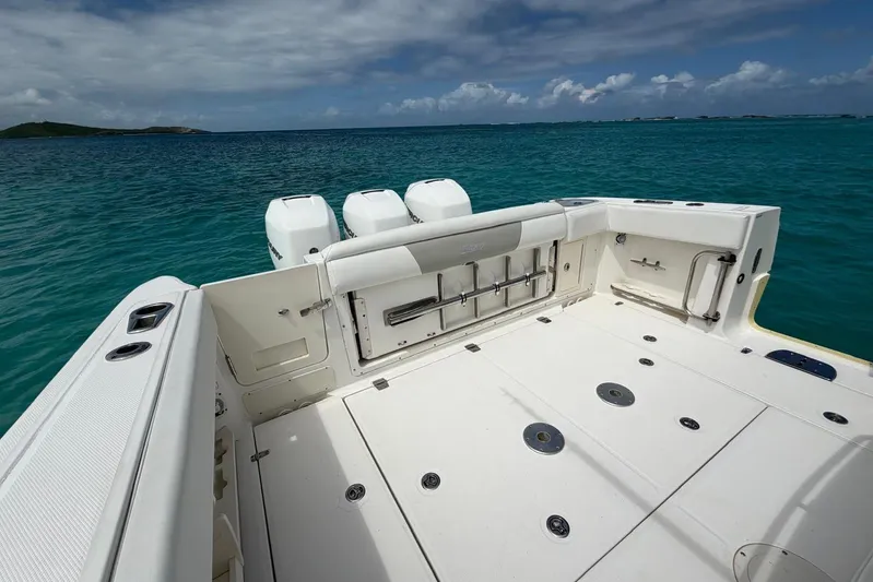  Yacht Photos Pics 2010 Boston Whaler 370 Outrage boat deck with ocean view and triple engines.