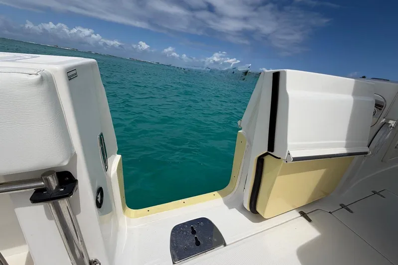  Yacht Photos Pics Boston Whaler 370 Outrage 2010 boat with open side door, ocean view.