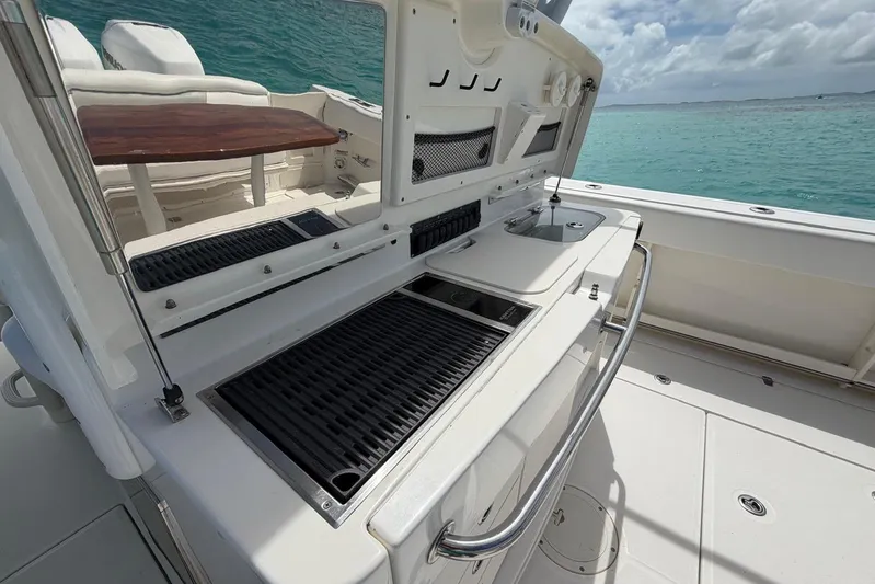  Yacht Photos Pics Boston Whaler 370 Outrage 2010 boat with outdoor kitchen and ocean view.