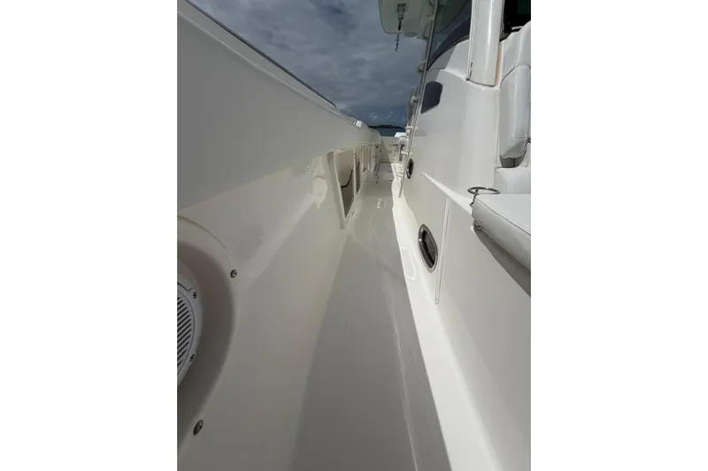  Yacht Photos Pics 2010 Boston Whaler 370 Outrage boat deck, showcasing sleek design and white finish.