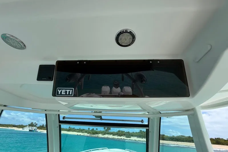  Yacht Photos Pics Interior view of a 2010 Boston Whaler 370 Outrage boat with ocean backdrop.