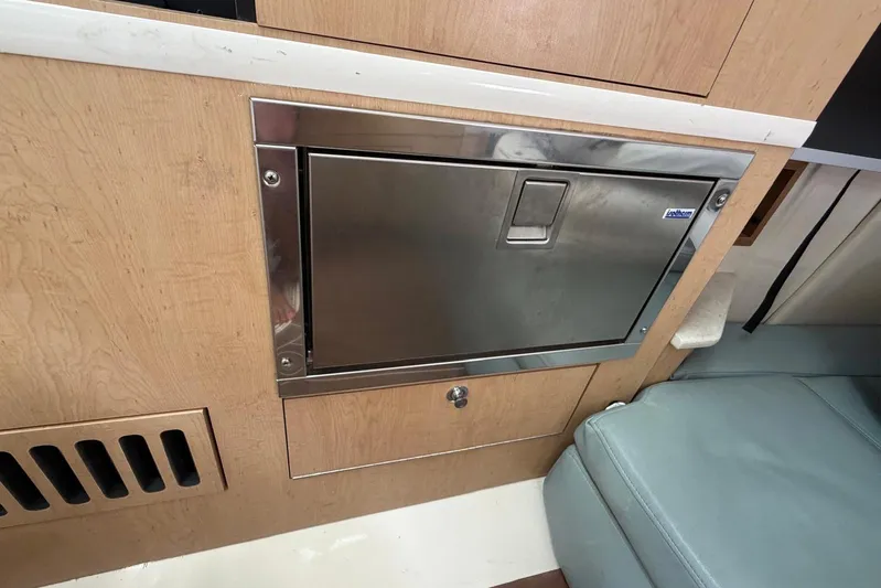  Yacht Photos Pics Interior of a 2010 Boston Whaler 370 Outrage featuring a stainless steel cabinet.