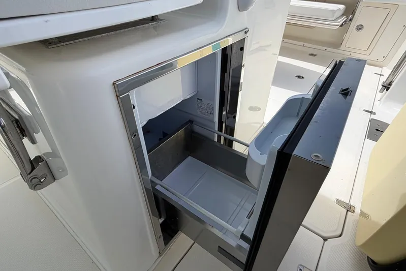  Yacht Photos Pics Open storage compartment on a 2010 Boston Whaler 370 Outrage boat.