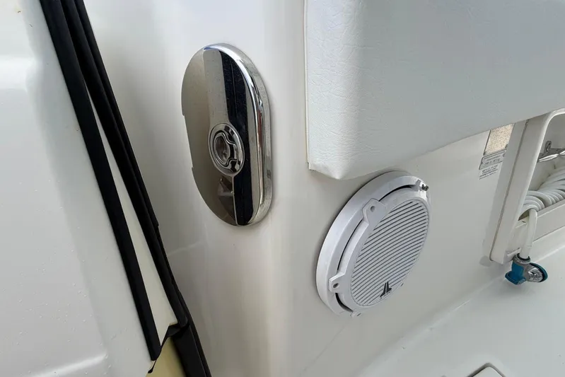  Yacht Photos Pics 2010 Boston Whaler 370 Outrage boat detail with speaker and chrome fixture.