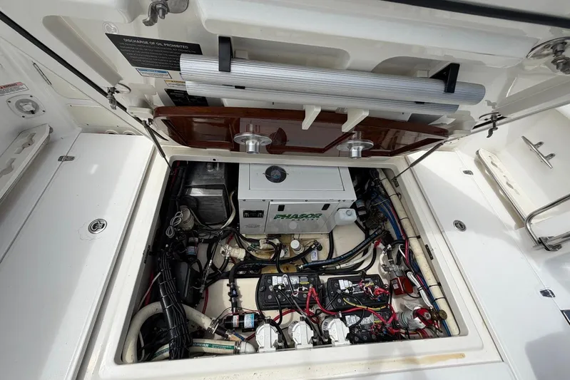  Yacht Photos Pics 2010 Boston Whaler 370 Outrage engine compartment with wiring and equipment.