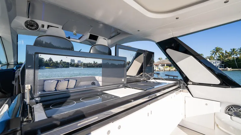 G-jazss Yacht Photos Pics 2022 Azimut Verve 47 yacht interior with modern kitchen and scenic water view.