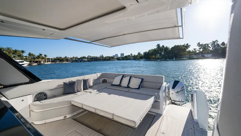 G-jazss Yacht Photos Pics Luxurious 2022 Azimut Verve 47 yacht with spacious deck and scenic waterfront view.