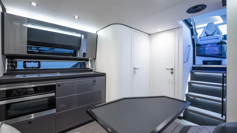 G-jazss Yacht Photos Pics Interior of 2022 Azimut Verve 47 yacht, featuring modern kitchen and sleek design.
