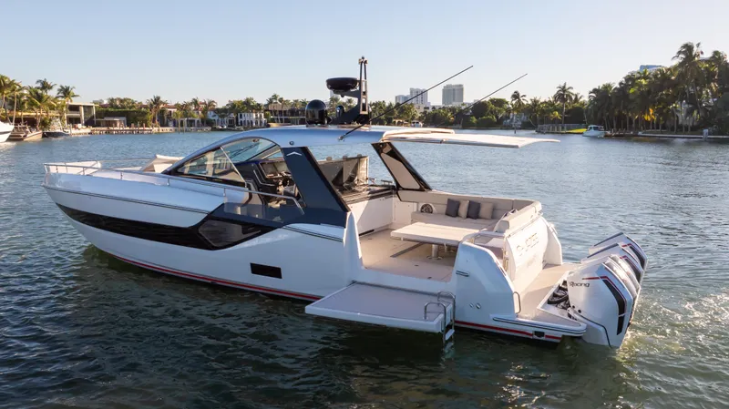 G-jazss Yacht Photos Pics 2022 Azimut Verve 47 yacht cruising on a sunny day in a scenic waterway.