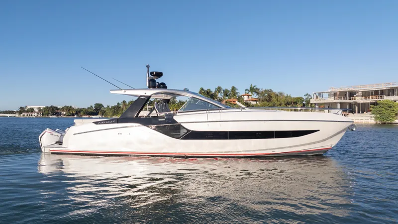 G-jazss Yacht Photos Pics 2022 Azimut Verve 47 yacht on calm water, clear sky background.