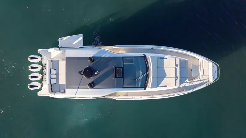 G-jazss Yacht Photos Pics Top view of 2022 Azimut Verve 47 luxury yacht on calm water.