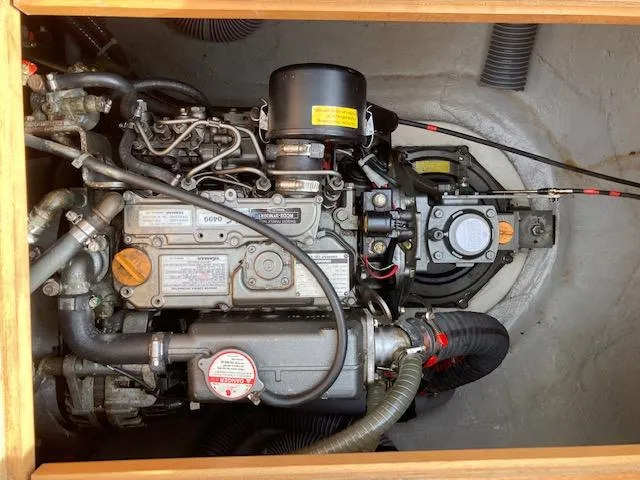 Oscar III Yacht Photos Pics Engine compartment of a 2018 Lagoon LAGOON 380 catamaran, showcasing detailed mechanical components.