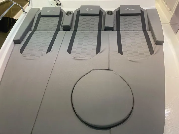  Yacht Photos Pics 2025 Hanover 387 boat interior with sleek gray seating and modern design.